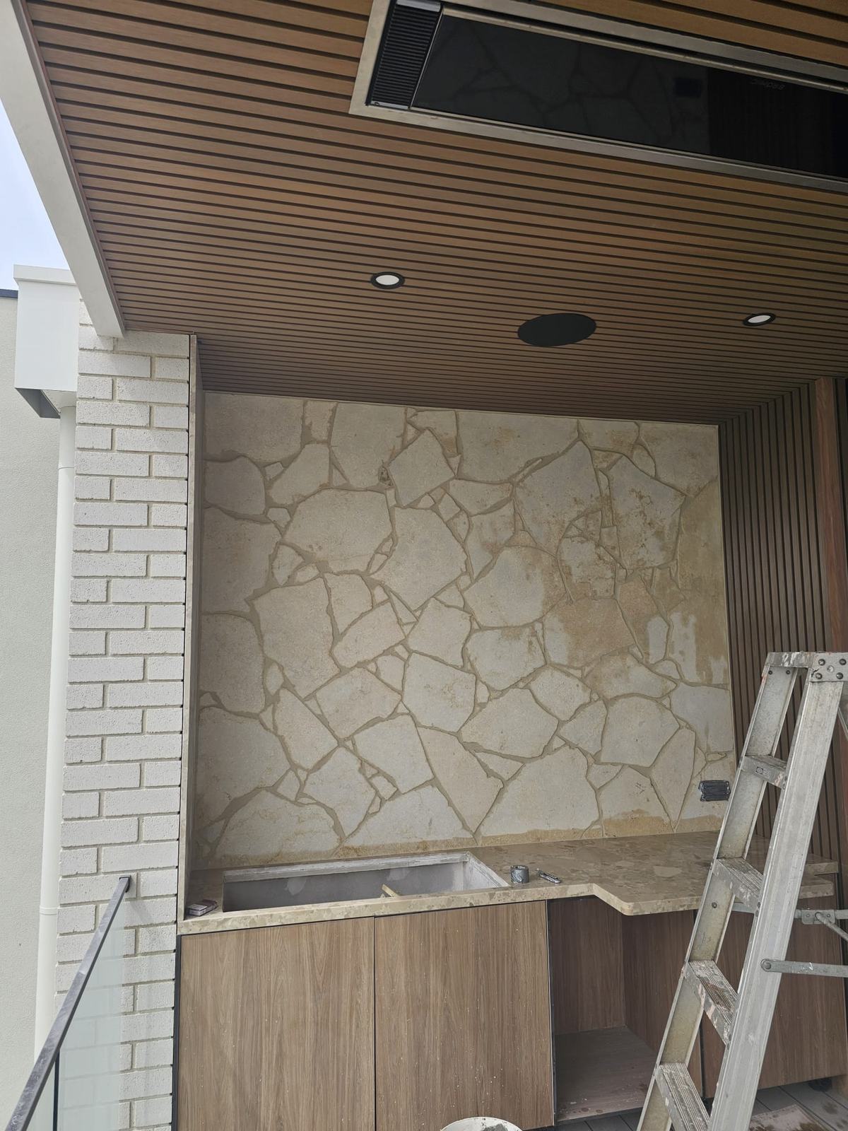 Natural stone feature wall in an alfresco area, Clifton Springs