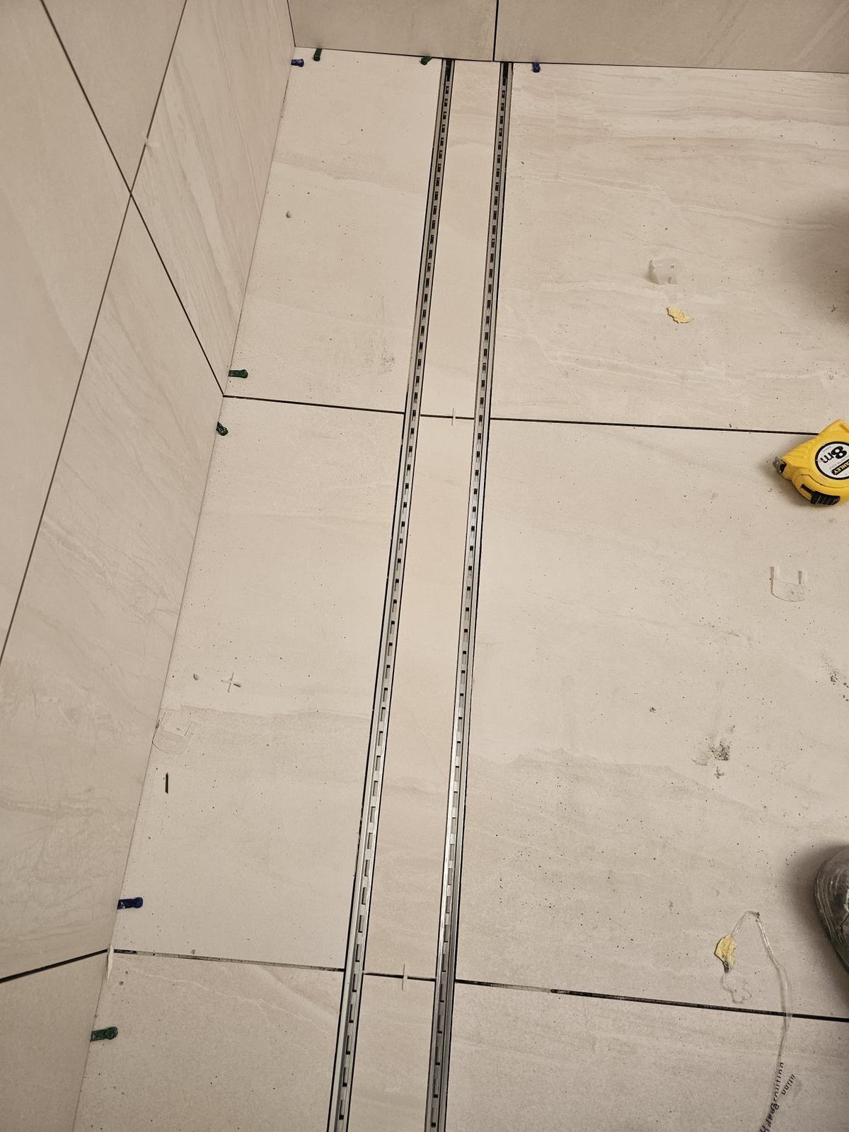 Wet-area floor tiled to a tile insert strip drain, Hawthorn